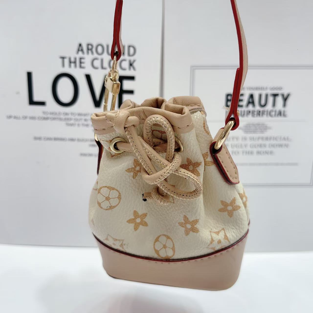 Bestseller Mini Coin Purse Bucket Print 2024 New Fashion Crossbody Women's Stylish Handheld Single Shoulder Bag ddmytues