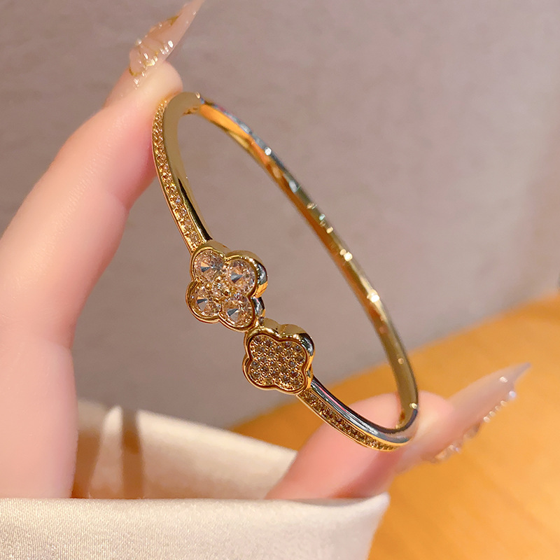 Gold Tone Crystal Flower Bangle Bracelet With Sparkling Accents Stylish Holiday Jewelry And Gift For Her High Quality And Fashion Accessory 4 leaf clo