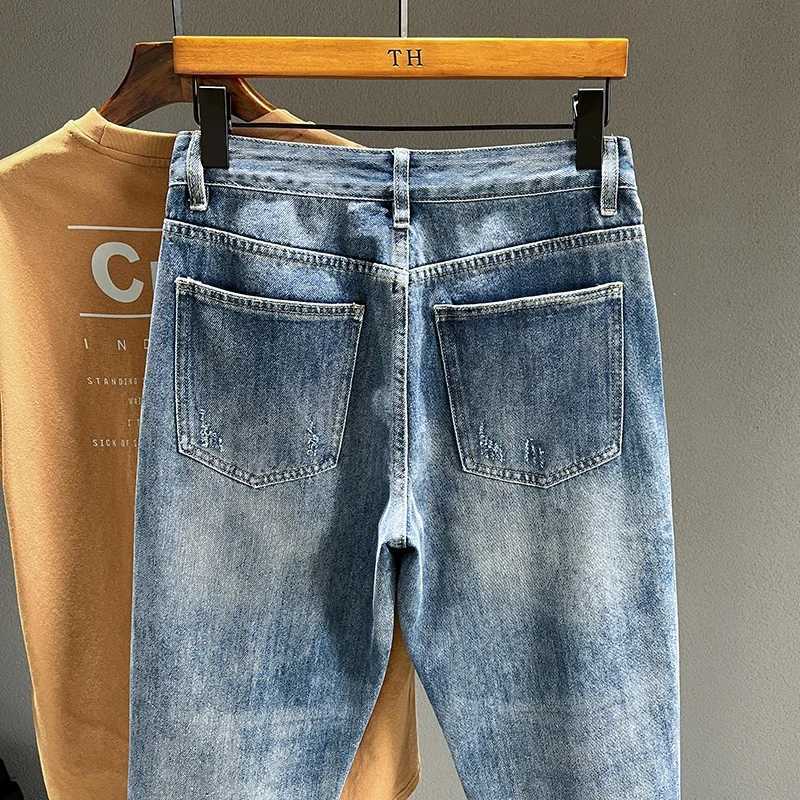 New Mens Ripped Jeans Personality Fashion Tapered Hole Frayed Denim Trousers Streetwear Casual Vintage Blue Pants Male ClothesZ250917