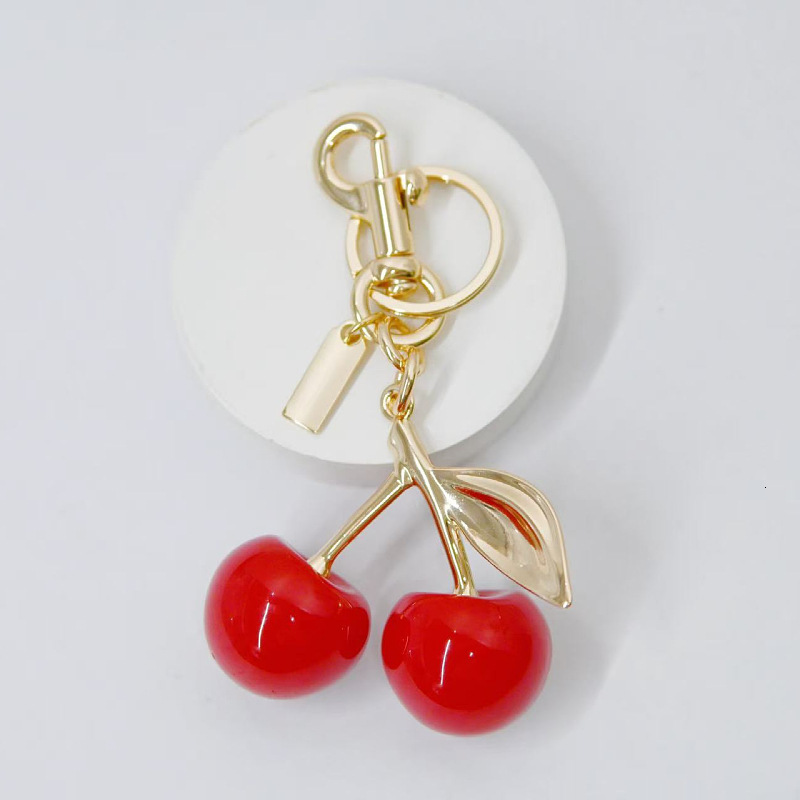 designer keychain c home solid color cherry bag charm cute keychain pendant Imitation fruit ornament luxury keychain wallet