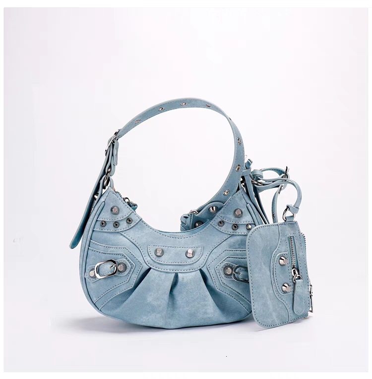 Trendy new motorcycle bag armpit bag fashionable design rivet spicy girl women s shoulder bag tassel women s crossbody bag autumn new designer bag