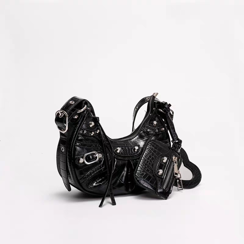 Trendy new motorcycle bag armpit bag fashionable design rivet spicy girl women s shoulder bag tassel women s crossbody bag autumn new designer bag