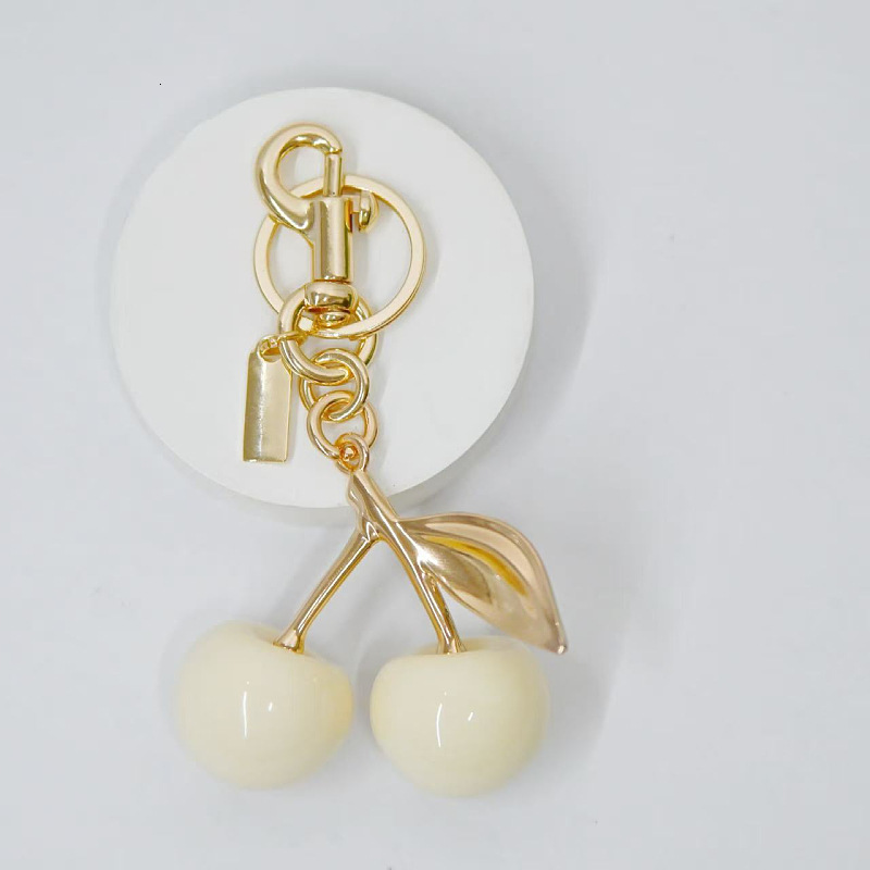 designer keychain c home solid color cherry bag charm cute keychain pendant Imitation fruit ornament luxury keychain wallet