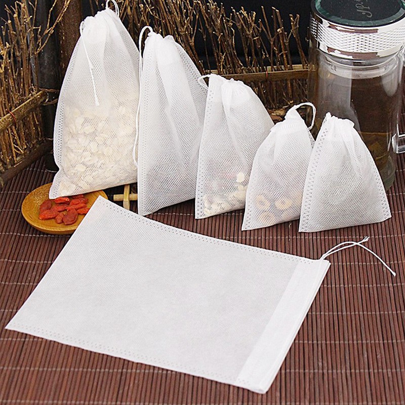 100 Pcs Coffee Filter Bag,Disposable Juice and Tea Bags,Filter Bag with String Heal Seal,Food-grade Non-woven Fabric Spice Filter Bag