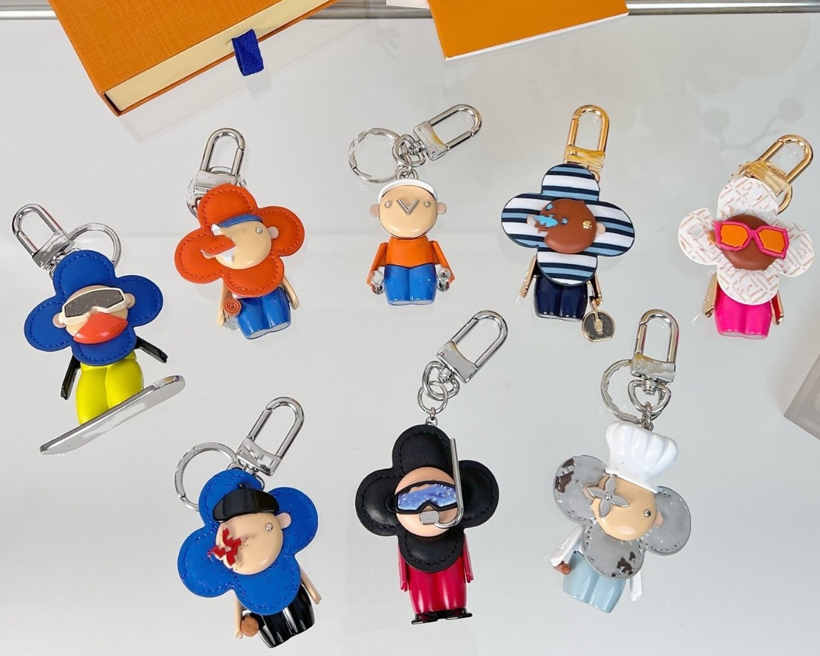 Luxurys keychain designer v bag charm gold chain 17styles flower Women men Buckle jewelry Keyring Bag chain Car Key