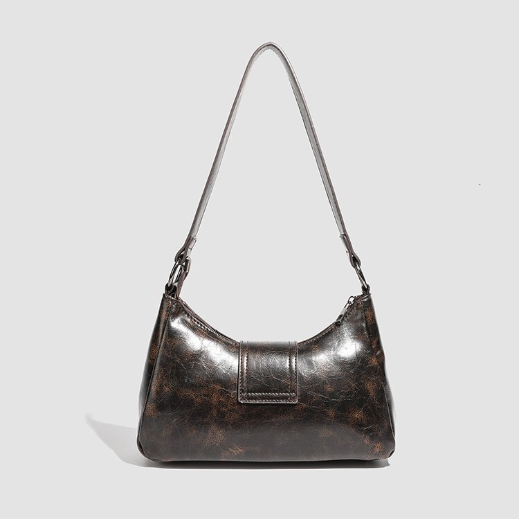 New retro fashion spicy girl women design s shoulder bag cool motorcycle bag commuting armpit bag autumn new designer bag women s handbag