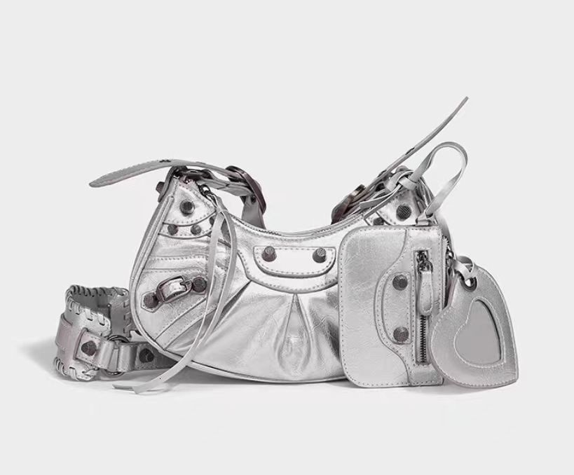 Trendy new motorcycle bag armpit bag fashionable design rivet spicy girl women s shoulder bag tassel women s crossbody bag autumn new designer bag