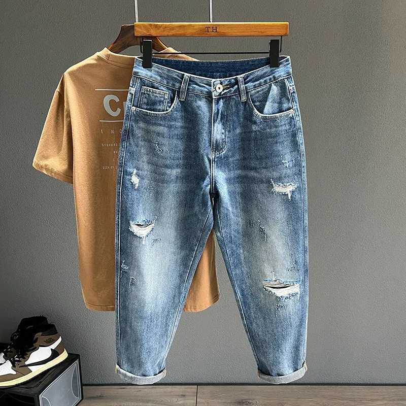 New Mens Ripped Jeans Personality Fashion Tapered Hole Frayed Denim Trousers Streetwear Casual Vintage Blue Pants Male ClothesZ250917