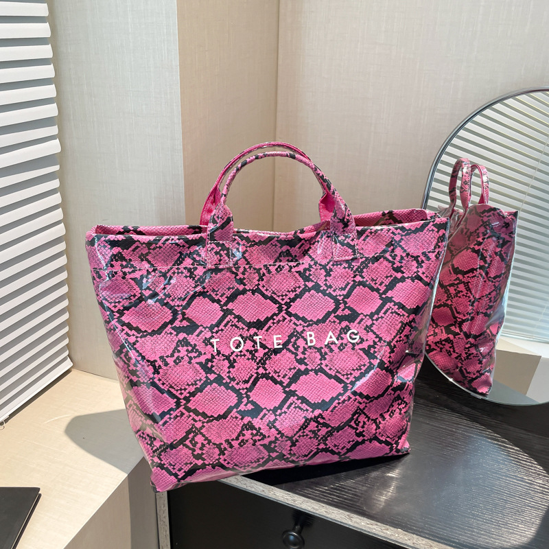 2025 New Women's PU Handbag Fashion Designer Handbag Large Capacity Uphandle Bag Serpentine Commuter Bag Waterproof Unique Hobo Bag