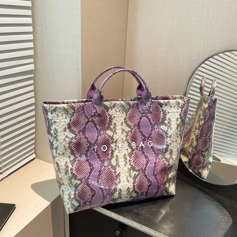 2025 New Women's PU Handbag Fashion Designer Handbag Large Capacity Uphandle Bag Serpentine Commuter Bag Waterproof Unique Hobo Bag