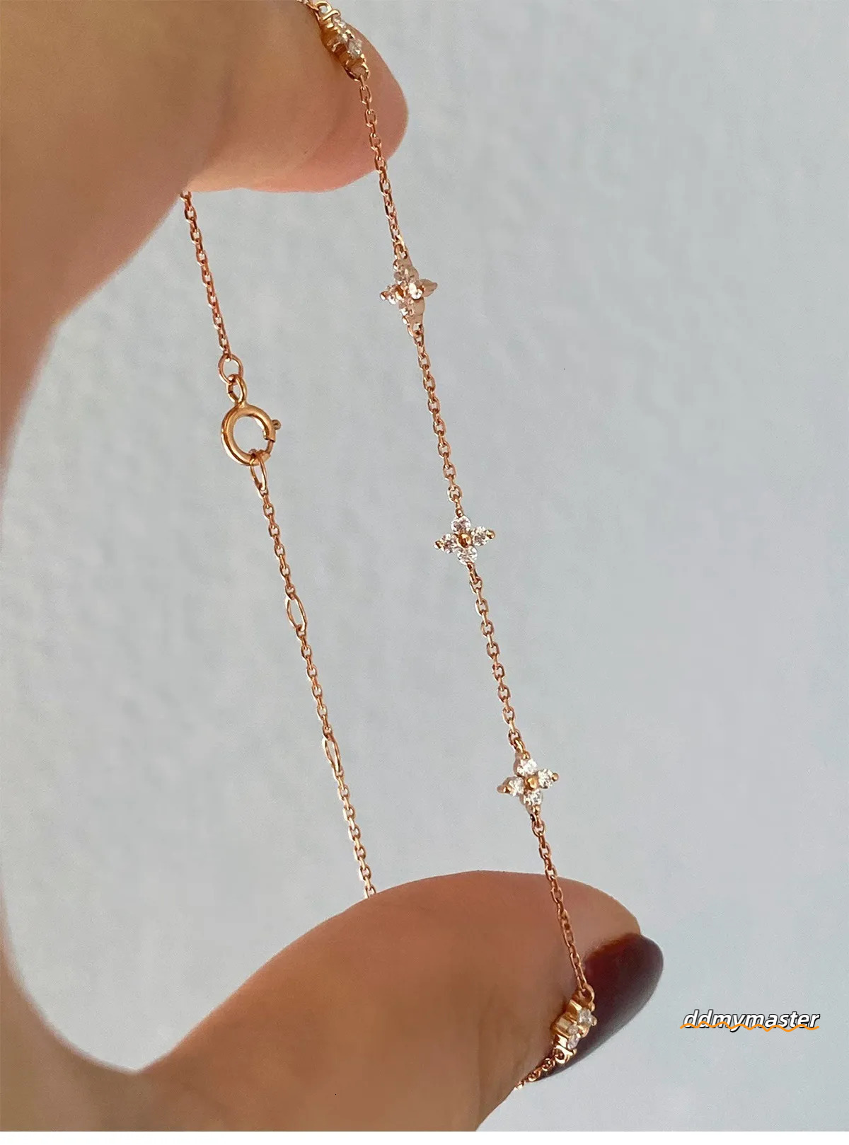 Designer Madam Flowing Light ~ S Plated Gold Four-Leaf Clover Star Bracelet Simple Zircon Pure Sier Women's Commuting ddmymaster