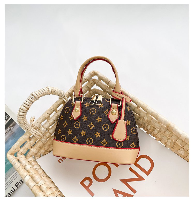 free shipping Fashionable trendy girl's children's handbag little girl's shell bag stylish chain diagonal cross bag