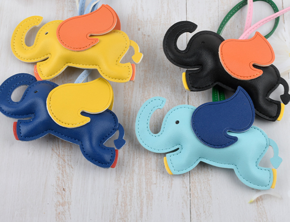 PU Leather Flying Wings Elephant Keychain Cute Cartoon Animal Hanger Car 16 Colors Bag Pendant for Women 250728