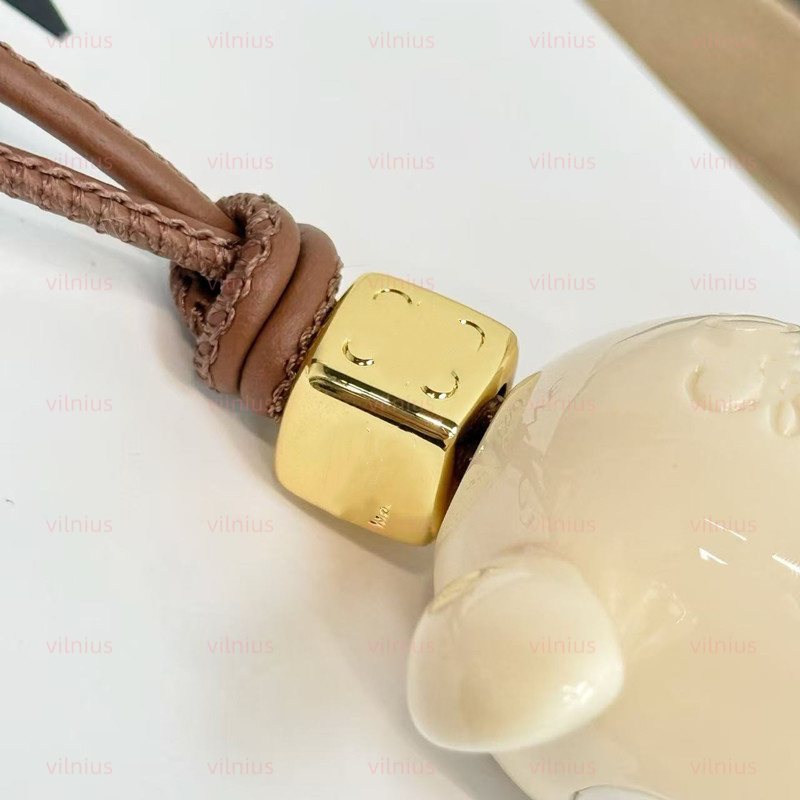 Kiwi Puzz charm calfskin and etate with looped Leather strap Anagram dice Keychains Bag Charm Exquisite Pendant Woman Cute Bkpk Bags cessories Handbag