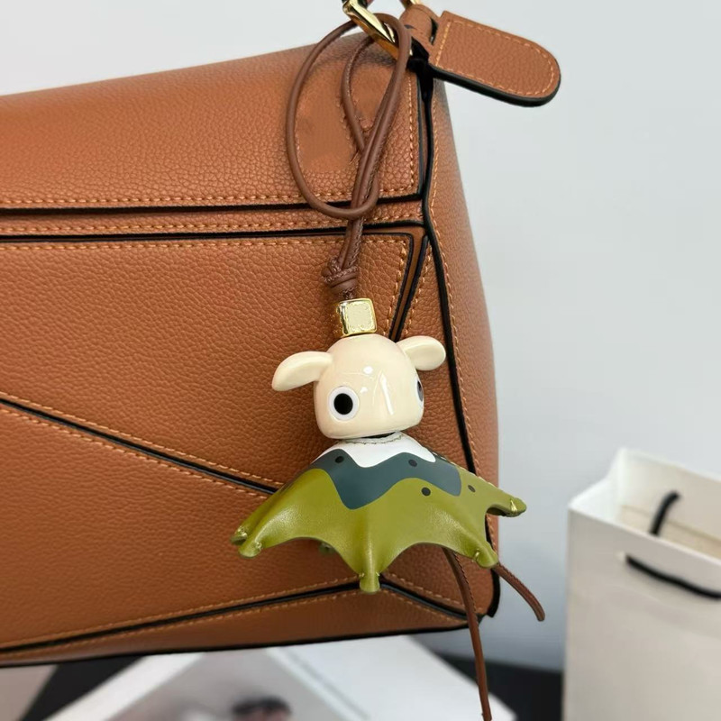 Kiwi Puzz charm calfskin and acetate with looped Leather strap Anagram dice Keychains Bag Charm Exquisite Pendant Woman Cute Backpack Bags Accessories Handbag