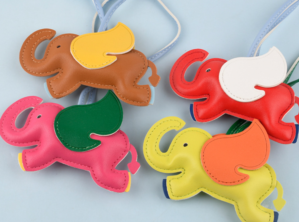 PU Leather Flying Wings Elephant Keychain Cute Cartoon Animal Hanger Car 16 Colors Bag Pendant for Women 250728