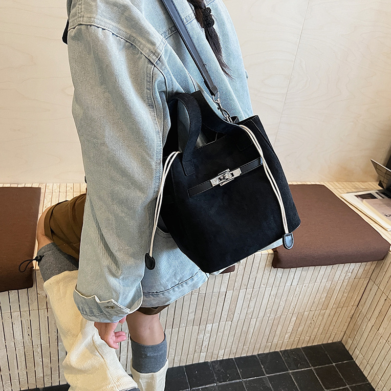 Designer bag free shipping New suede bucket bag with large capacity for commuting to work single shoulder cross body bag black red brown coffee