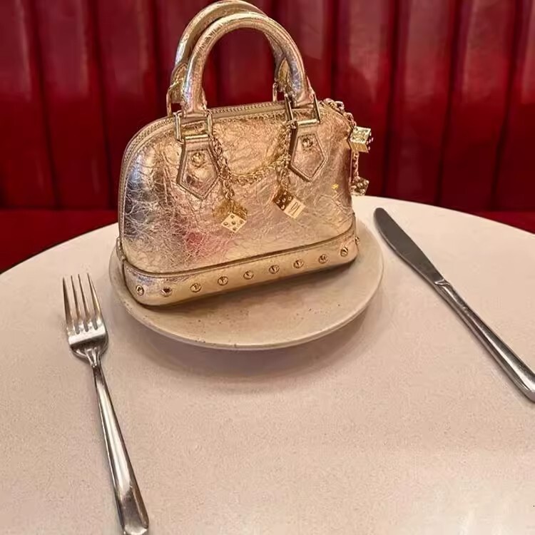 spice girls European and American style rivet shell bag new rivet clutch commuter light luxury shoulder width bag designer handbag