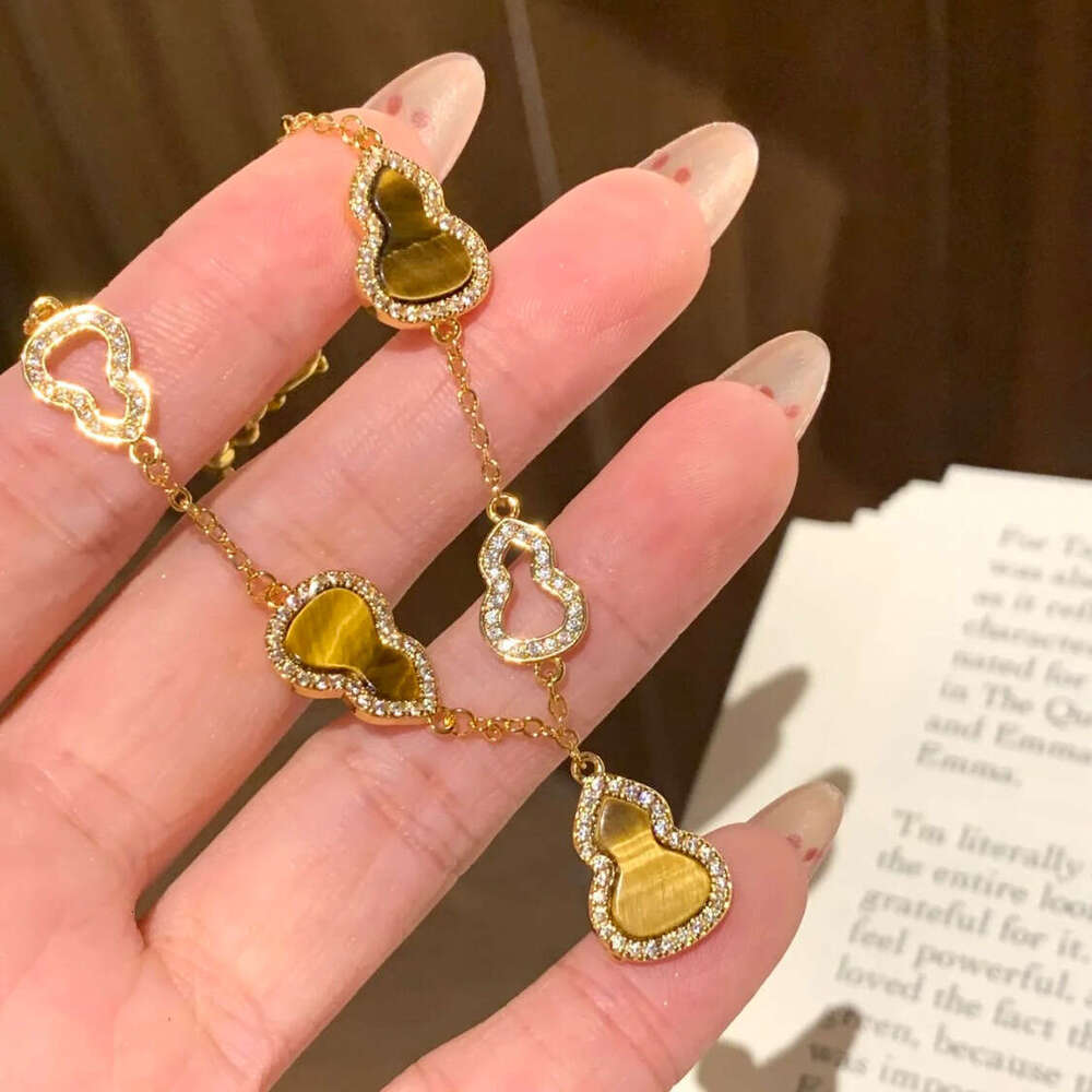 Inlaid Hollow Gourd Tiger Eye Stone New Chinese Style Exquisite Versatile Bracelet Light High-end Elegant Women's Jewelry