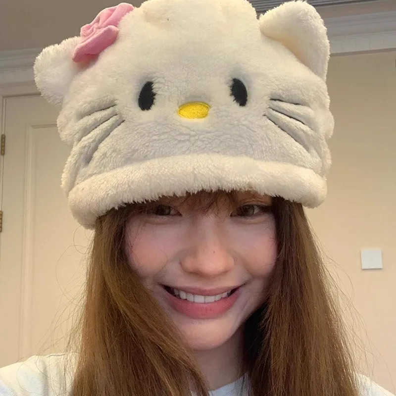 Sanrio Japanese sweet cartoon hellokitty plush hat energetic autumn and winter white Katie girl heart ear protection hat L250919