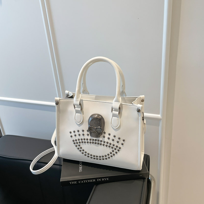 New Hot Girl Rivet Bag Black Skull Handbag Cool Women s Shoulder Bag Autumn New Designer Bag Light Luxury Simple Women s design Crossbody Bag