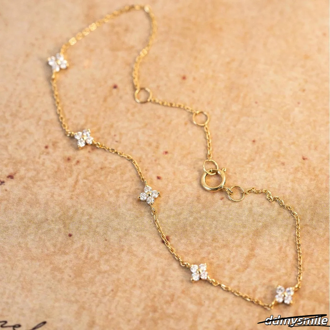 Designer Madam Flowing Light ~ S Plated Gold Four-Leaf Clover Star Bracelet Simple Zircon Pure Sier Women's Commuting ddmysmile