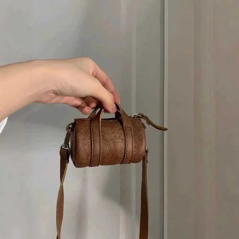 New retro brown mini exquisite niche ins hanging neck crossbody highend cylindrical shoulder bagXJ250918