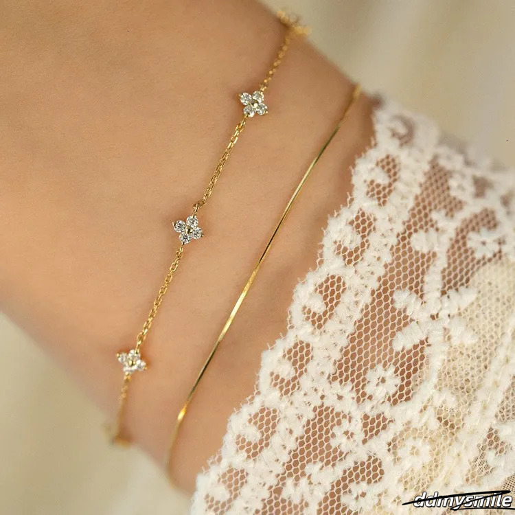 Designer Madam Flowing Light ~ S Plated Gold Four-Leaf Clover Star Bracelet Simple Zircon Pure Sier Women's Commuting ddmysmile