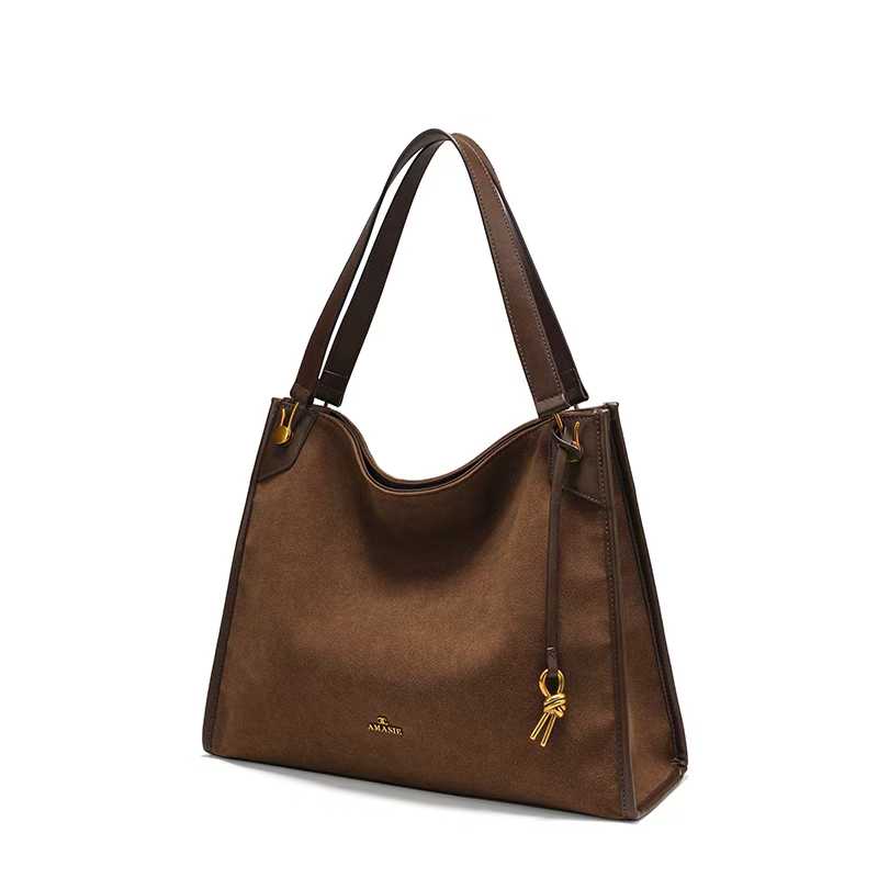 COCIO designer bag New leather bucket bag simple versatile multi compartment handbag niche design hot selling womens bag Modern