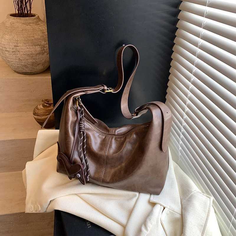 2025 New Retro Melad Color Series Womens Large Capacity Versatile Leisure Niche Single Shoulder Crossbody Bag Commuting DumplinXJ250918