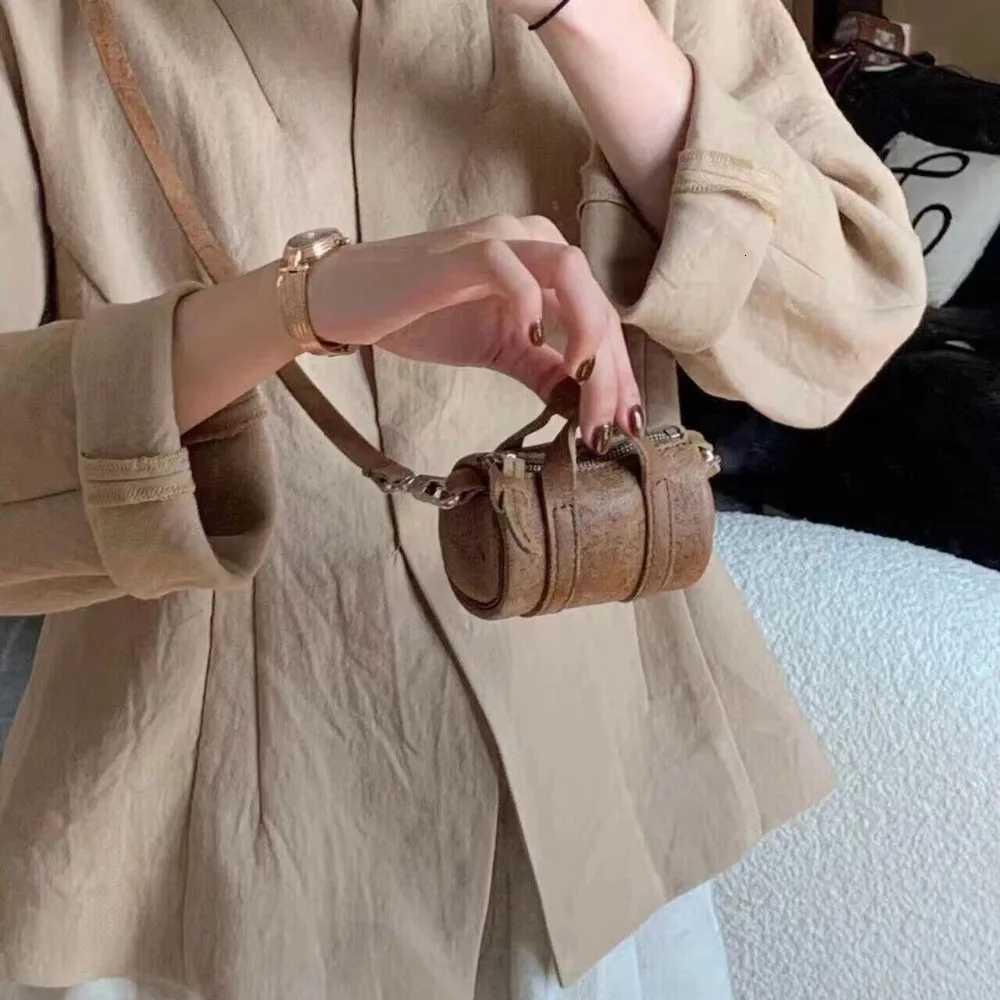 New retro brown mini exquisite niche ins hanging neck crossbody highend cylindrical shoulder bagXJ250918