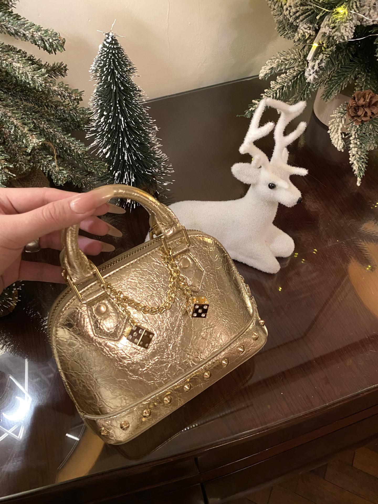 spice girls European and American style rivet shell bag new rivet clutch commuter light luxury shoulder width bag designer handbag