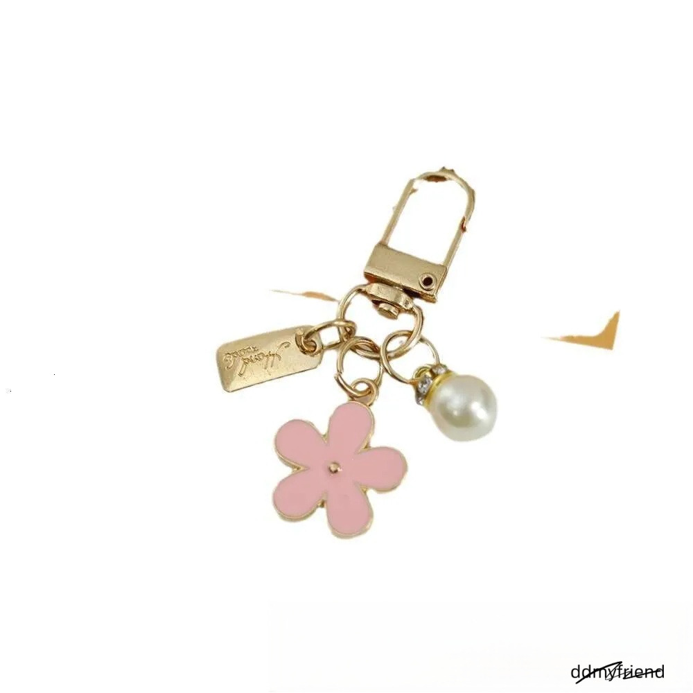 INS Metal Daisy Pearl Keychain Niche Flower Bluetooth Earphone Case Accessories ddmyfriend