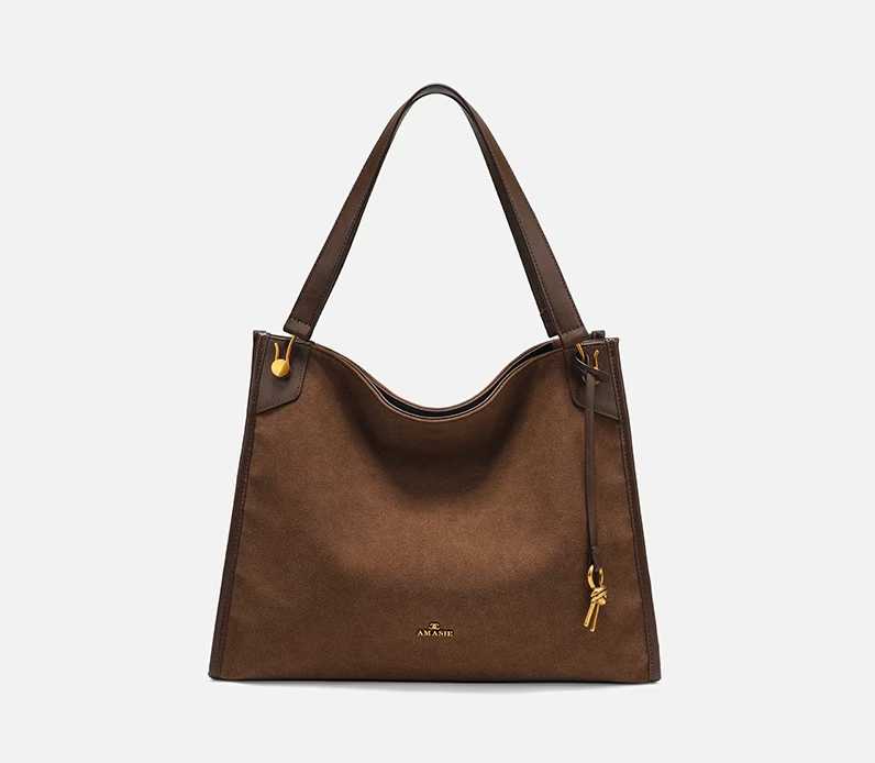 COCIO designer bag New leather bucket bag simple versatile multi compartment handbag niche design hot selling womens bag Modern