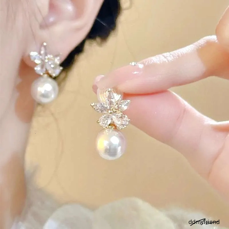 Dhcollections Summer Zircon Flower For Women, Light , Niche, High-End, Simple, Elegant Pearl Earrings ddmyfriend