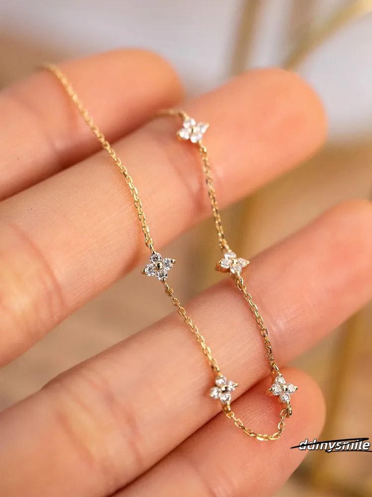 Designer Madam Flowing Light ~ S Plated Gold Four-Leaf Clover Star Bracelet Simple Zircon Pure Sier Women's Commuting ddmysmile