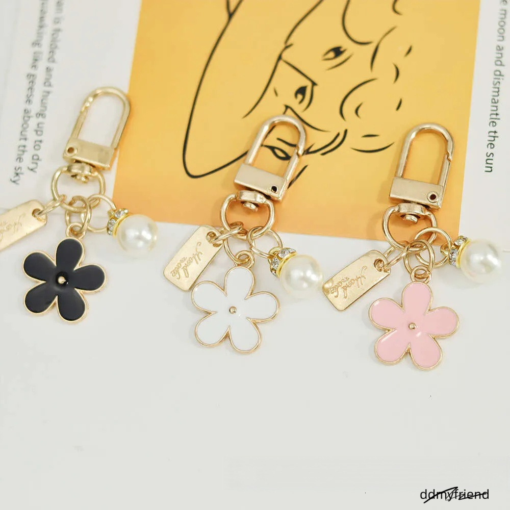 INS Metal Daisy Pearl Keychain Niche Flower Bluetooth Earphone Case Accessories ddmyfriend