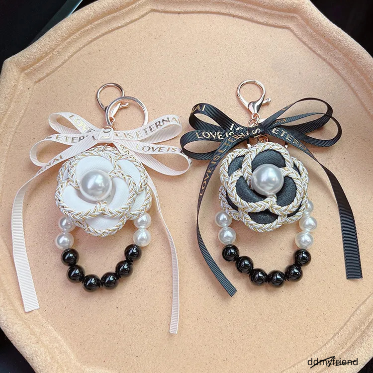 Denim Patchwork Camellia Designer Charms Braided Black White Bracelet Keyring Luxcury Pearl Chain Bag Key Accessory ddmyfriend