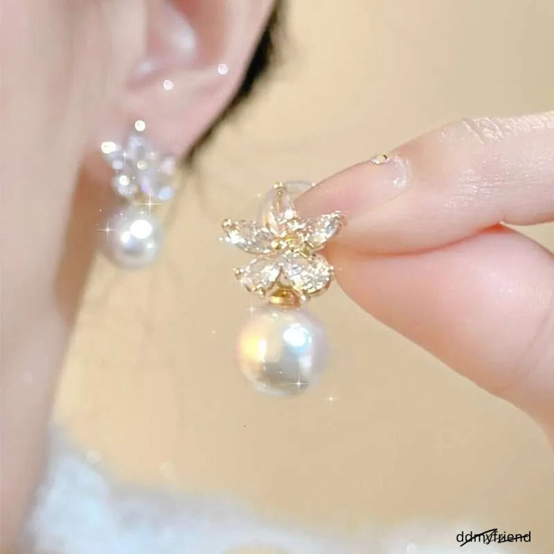 Dhcollections Summer Zircon Flower For Women, Light , Niche, High-End, Simple, Elegant Pearl Earrings ddmyfriend