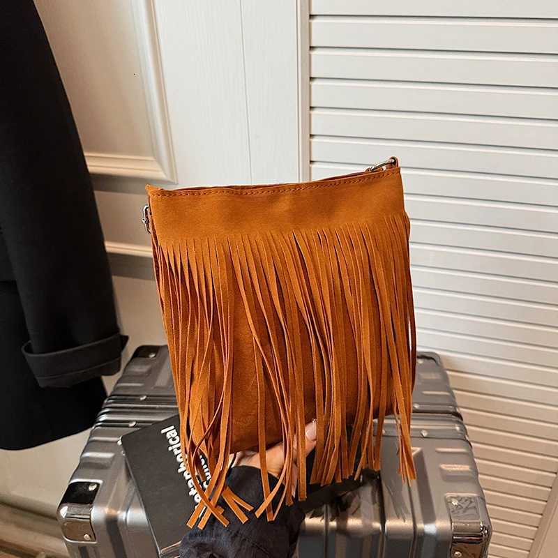 New and trendy Koreanstyle matte fringe bucket bag suitable for fashion outings and daily commutes as a shoulder bagXJ250918