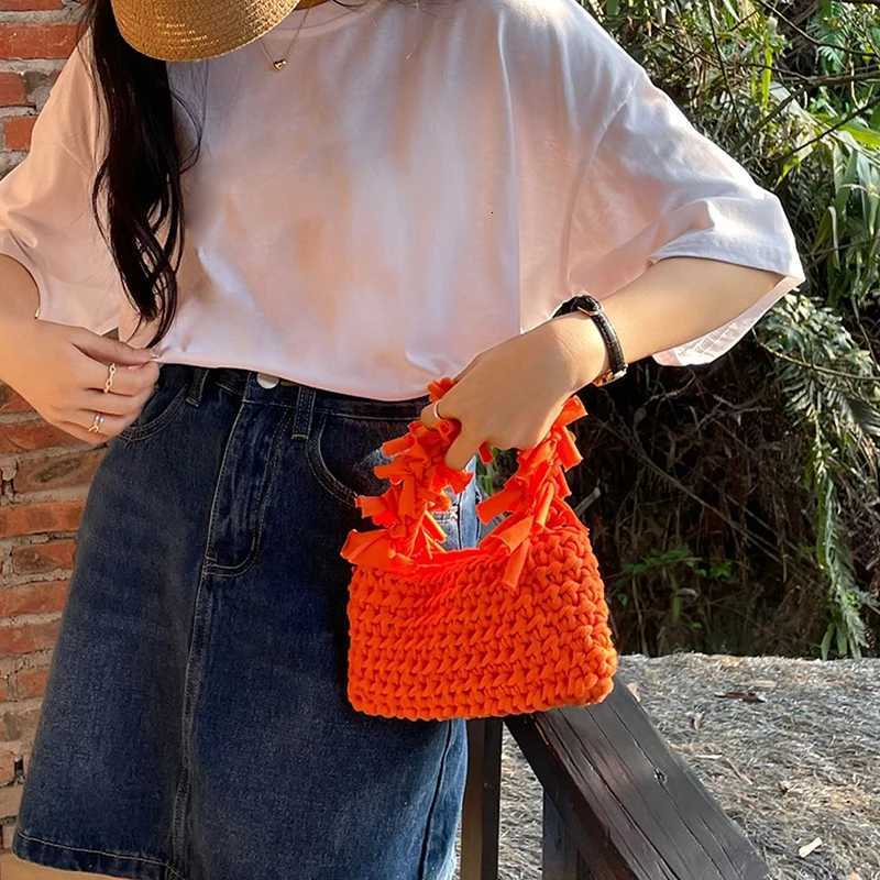 Spring And Summer Handwoven Womens Handheld Bag Leisure Small Fresh Hollow Out Small Design Holiday Bag Z250915