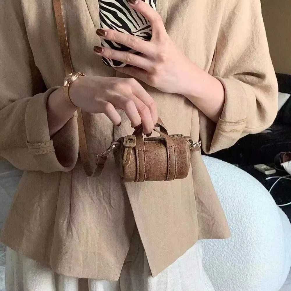 New retro brown mini exquisite niche ins hanging neck crossbody highend cylindrical shoulder bagXJ250918