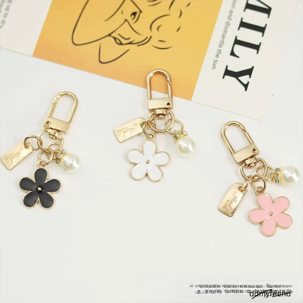 INS Metal Daisy Pearl Keychain Niche Flower Bluetooth Earphone Case Accessories ddmyfriend
