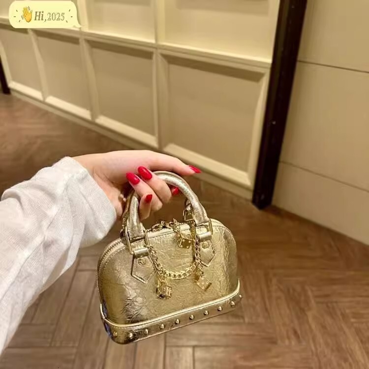 spice girls European and American style rivet shell bag new rivet clutch commuter light luxury shoulder width bag designer handbag