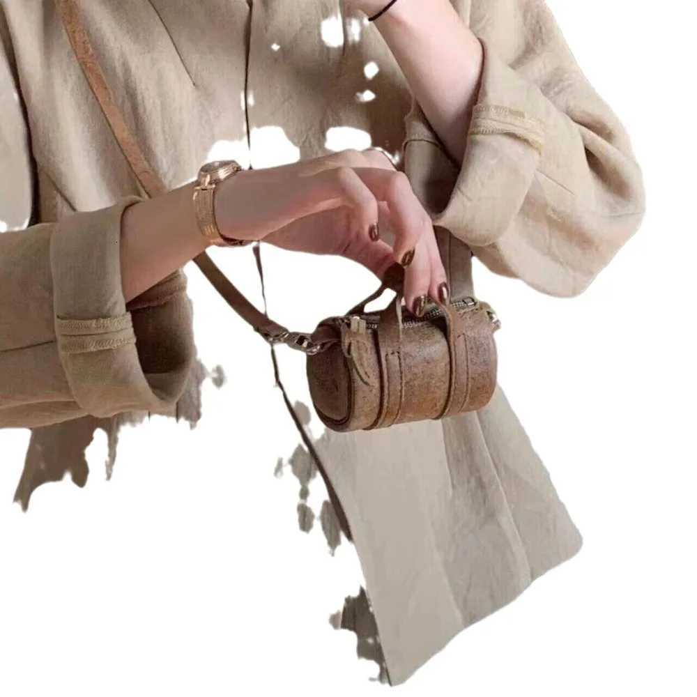 New retro brown mini exquisite niche ins hanging neck crossbody highend cylindrical shoulder bagXJ250918