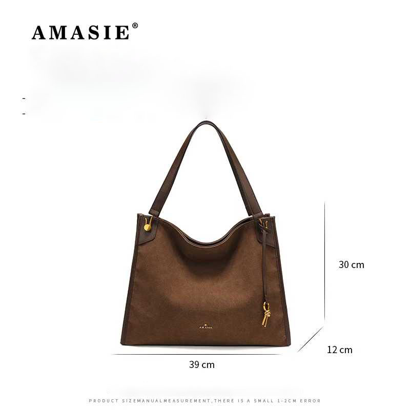 COCIO designer bag New leather bucket bag simple versatile multi compartment handbag niche design hot selling womens bag Modern