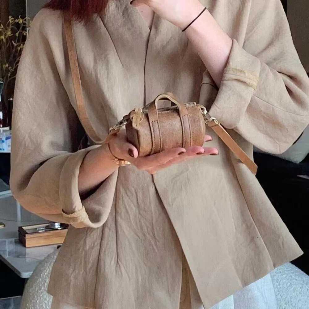 New retro brown mini exquisite niche ins hanging neck crossbody highend cylindrical shoulder bagXJ250918