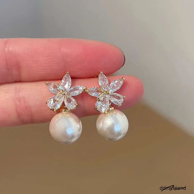 Dhcollections Summer Zircon Flower For Women, Light , Niche, High-End, Simple, Elegant Pearl Earrings ddmyfriend