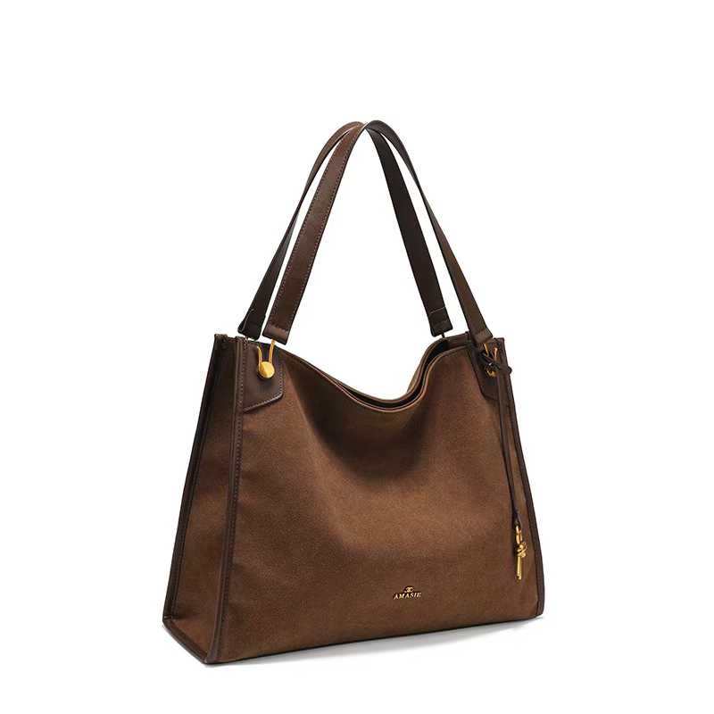 COCIO designer bag New leather bucket bag simple versatile multi compartment handbag niche design hot selling womens bag Modern