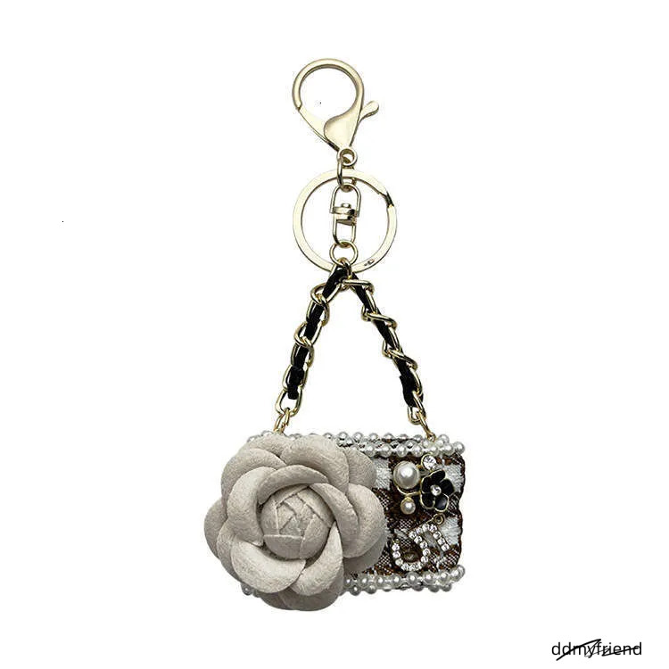 Wholesale Chic Camellia Keychain - Fashion Bag Charm For Women, Elegant Zinc Alloy Car Key Ring In Black/White/Khaki (24G) ddmyfriend